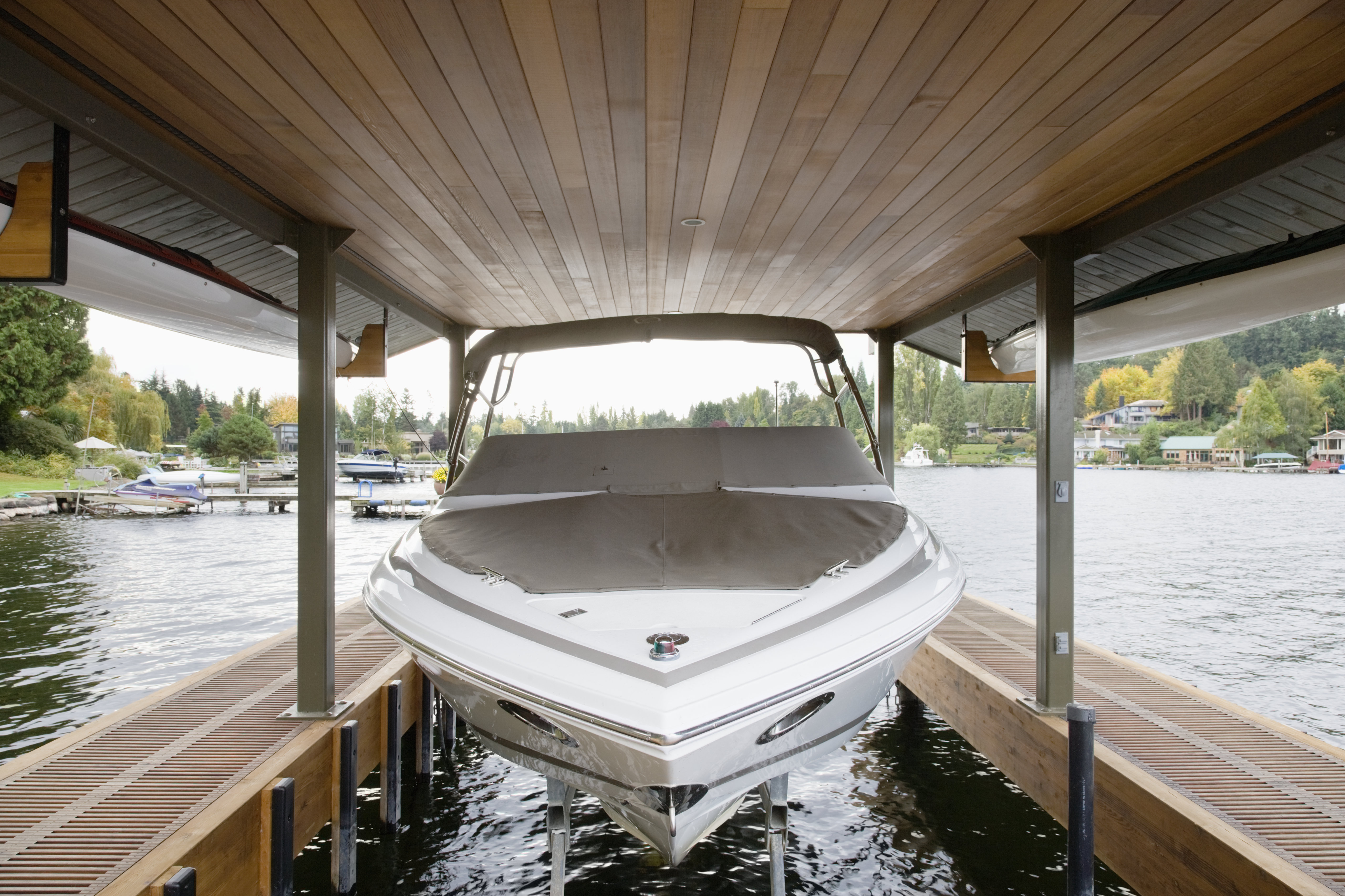 Boat lift installation on residential waterfront property