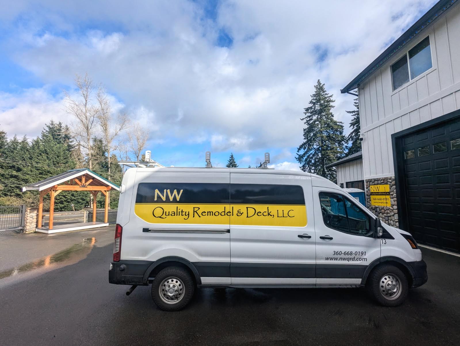 Professional window installation team working on residential home