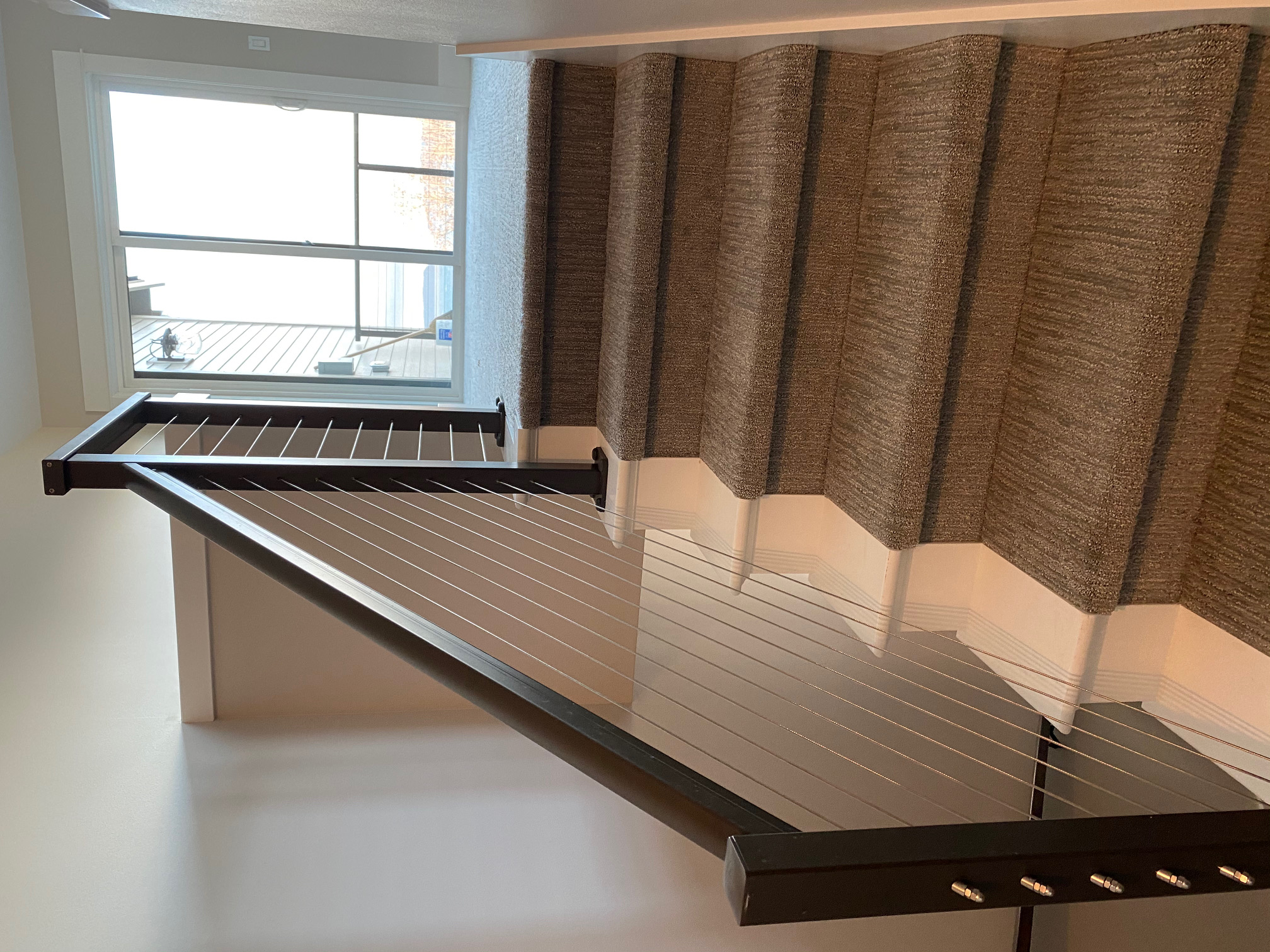 Interior remodeling project with updated stairs and finishes